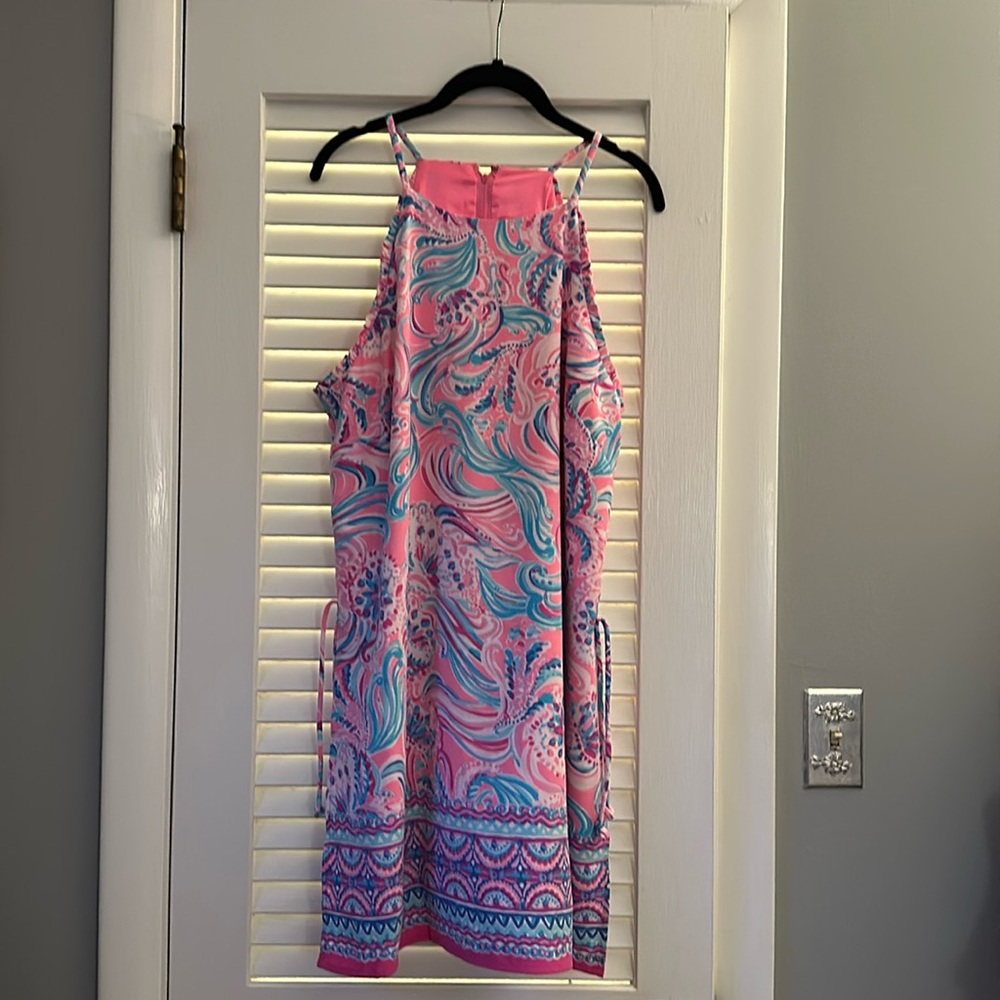 Brand New Lily Dres/Romper with shorts underneath.